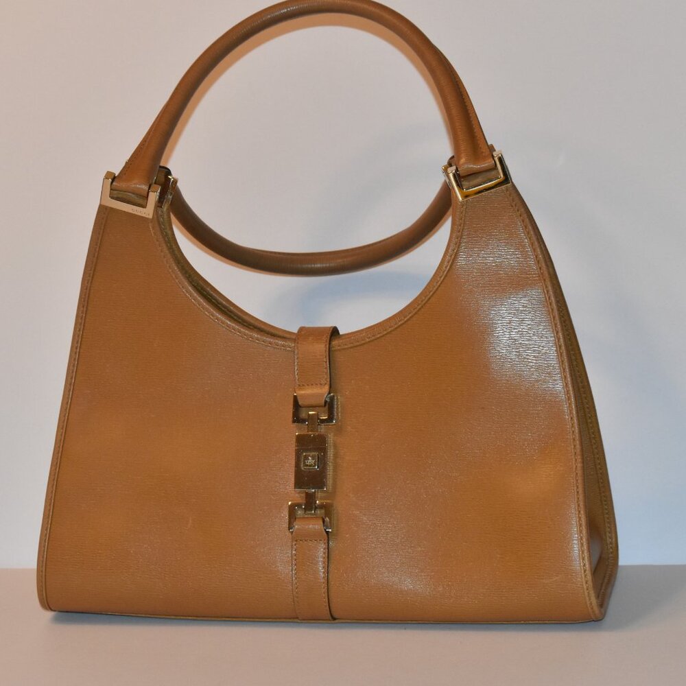 Vintage Gucci Bardo hobo bag in camel leather with the piston-lock closure